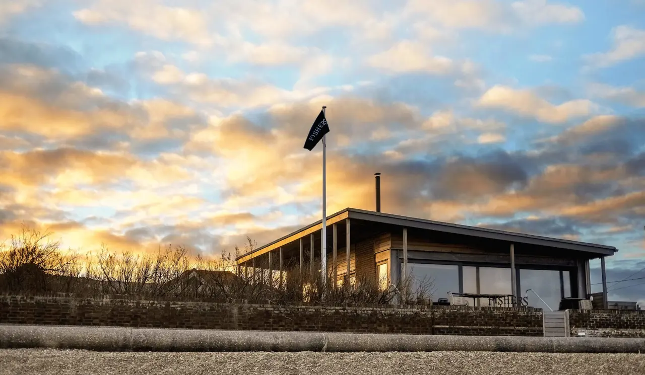 Exterior of Fishers Distillery from the beach